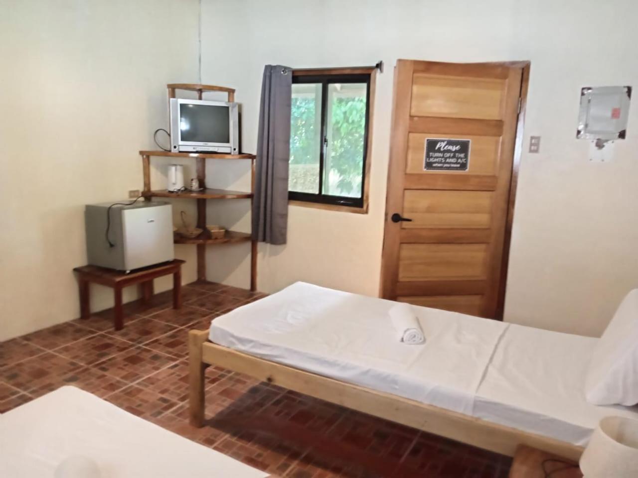 Chelle'S Guesthouse And Backpackers Siquijor Exterior foto